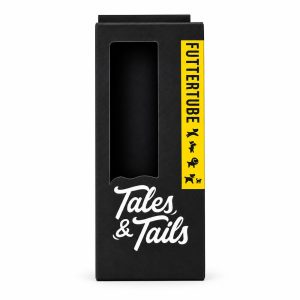Schwarze Verpackung der Tales & Tails Futtertube mit Sichtfenster und gelbem Schriftzug «Futtertube»